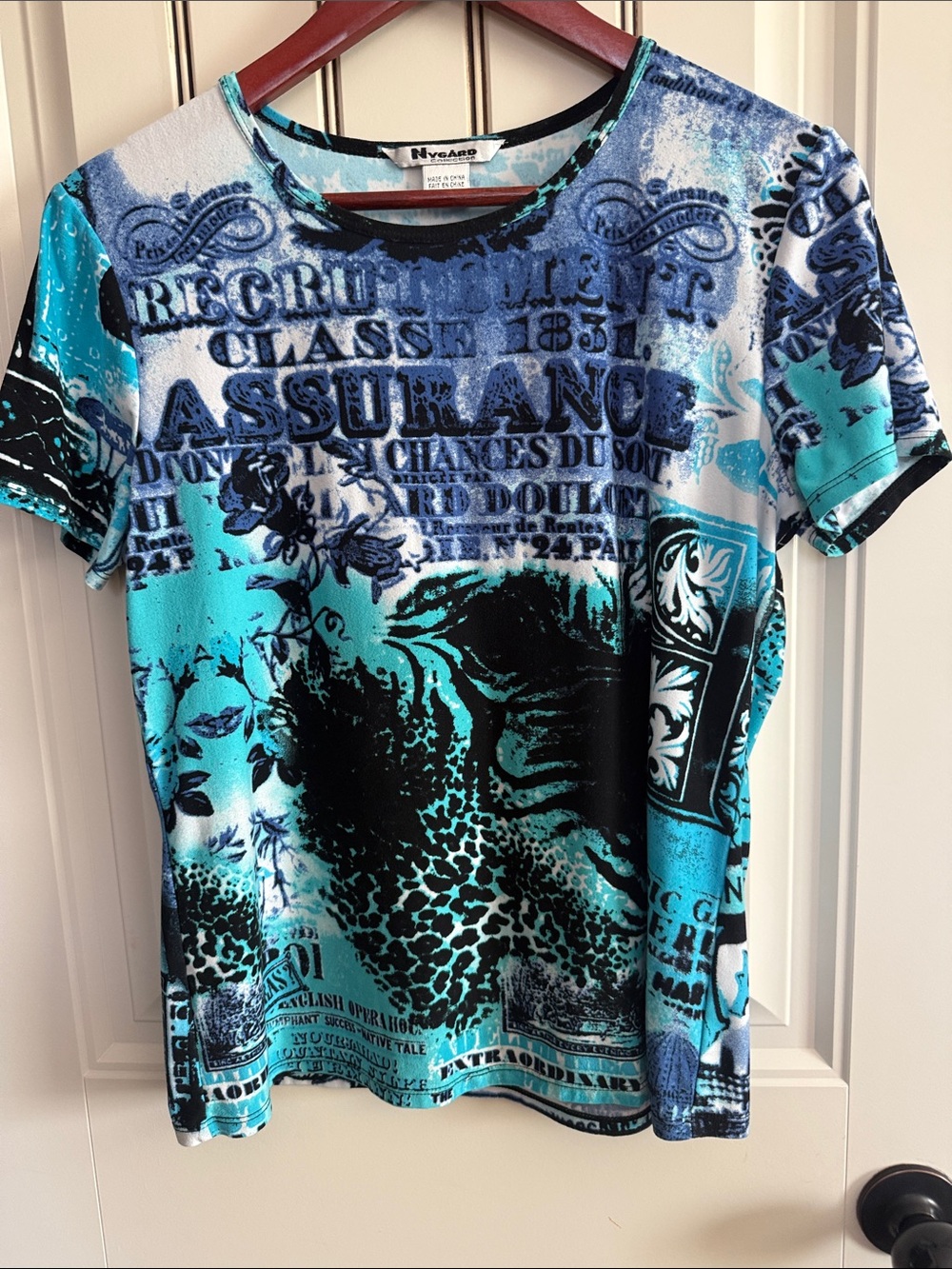 Peter Nygard Graphic Teal & Black Short Sleeve Top With Scripting.